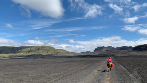 cyclist on a gravel road in iceland